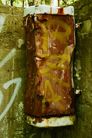 A rotten boiler in a ruin in the forestの写真素材