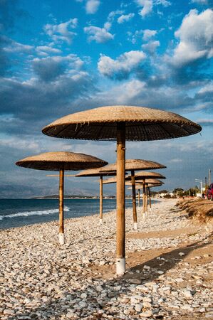 Beach umbrella on the beach of Korfu, Greeceの写真素材