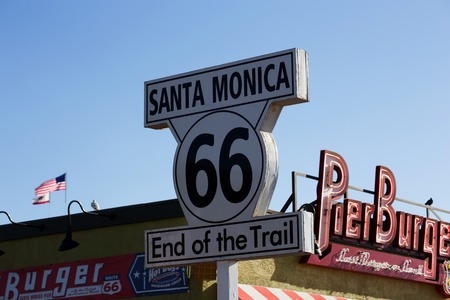 Route 66 End of the Trail sign on Santa Monica Pier, Santa Monica, Californiaのeditorial素材