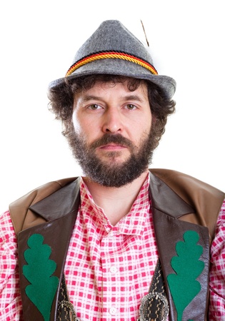 Close-up portrait of a middle-aged man in traditional, authentic bavarian dress.

Self-portrait, isolated on white.の写真素材