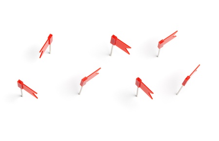 Set of red push pins, in flag form, with real shadows, isolated on white background.の写真素材