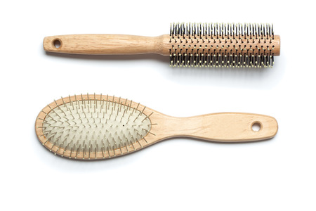Pair of two brushes made from wood. Studio shot, isolated on white background.の写真素材