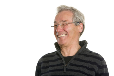 Portraits of a senior Caucasian man with glasses in casual clothing. Isolated on white background.の写真素材
