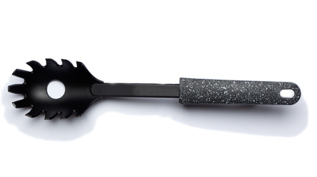 Plastic Spaghetti Server. Part of a series of kitchen utensils. Isolated on white background.の写真素材