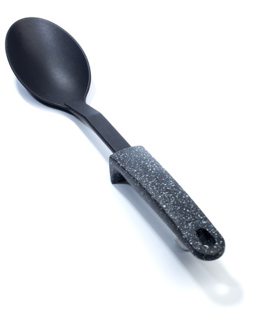 Plastic Serving Spoon. Part of a series of kitchen utensils. Isolated on white background.の写真素材
