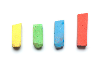 Bars of colored street chalk, usually used by kids on stone. Studio shot, isolated on white background.の写真素材