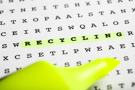 Puzzle, riddle letter grid with text marker - word Newsletter marked in yellow.の写真素材