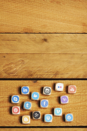 Concept - cubes of internet icons as game. Set of dices with logos from most popular social media networks, including Facebook, Google, Instagram, Twitter, Pinterest, LinkedIn and many moreのeditorial素材