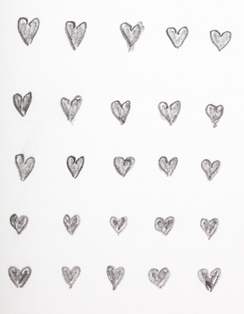 Hand drawn pencil sketches of heart shapes, repetition exercisesの写真素材