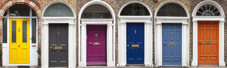Doors in different colors painted as protest against English King George legal reign over the city of Dubline in Irelandの写真素材