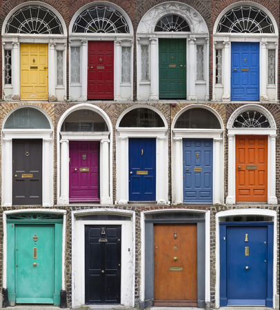 Doors in different colors painted as protest against English King George legal reign over the city of Dubline in Irelandの写真素材