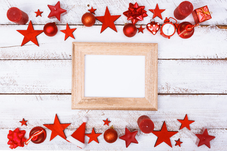 Christmas ornaments flat lay border on white table with copy spaceの写真素材