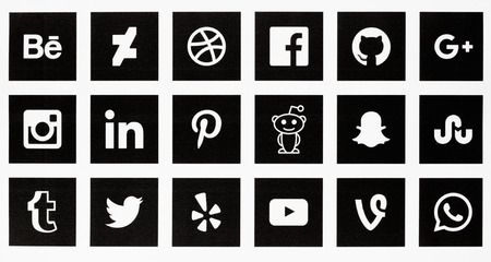 BERLIN, NOVEMBER 14, 2017 - Set of most popular social media internet website brand logos printed in black and white on paper.のeditorial素材