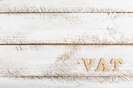 VAT word as headline on white painted tableの写真素材