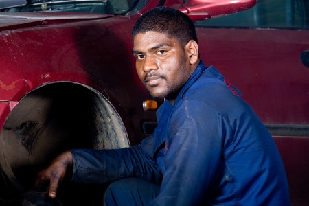 portrait of an indian mechanicの写真素材