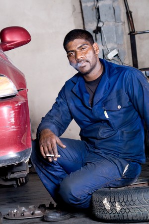 portrait of an indian mechanicの写真素材