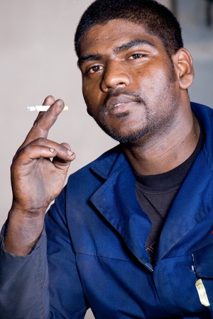 portrait of an indian mechanicの写真素材