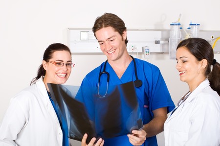 group of doctors looking at lung x-ray filmの写真素材