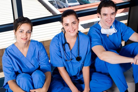 group of young doctors and nurses relaxing