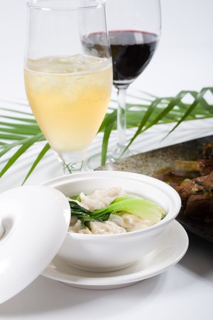chinese wonton soup and wineの写真素材