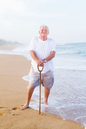 happy senior man on beachの写真素材