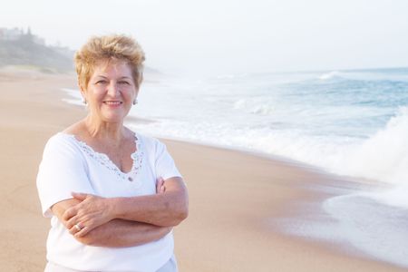 portrait of senior woman on beachの写真素材