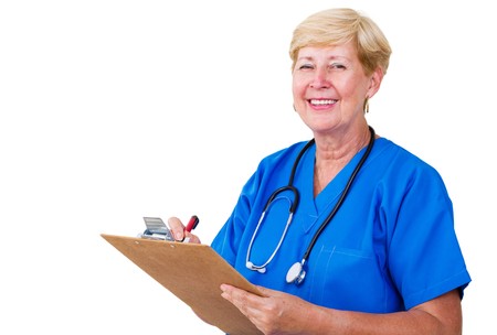 senior nurse writing on clipboardの写真素材