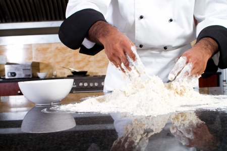 professional chef making doughの写真素材