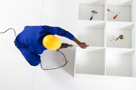 carpenter assembling furnitureの写真素材