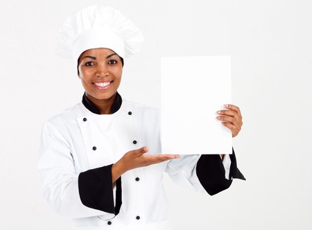 african american female chef presenting menuの写真素材