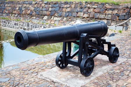antique cast iron cannon at castle of good hope, cape town