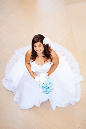 overhead view of a beautiful bride in wedding dressの写真素材