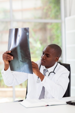 african american doctor diagnosis patient's x-rayの写真素材