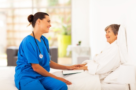 friendly nurse visiting recovering senior patient friendly nurse visiting recovering senior patient