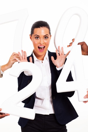 fun businesswoman with numbers around herの写真素材