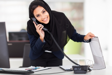 pretty modern Muslim businesswoman working in officeの写真素材