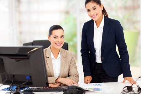 portrait of beautiful smiling business women in officeの写真素材
