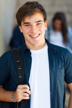 portrait of happy male high school student smiling