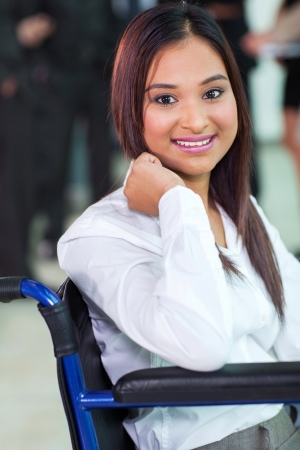 beautiful disabled office worker in a wheelchairの写真素材