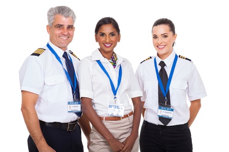 beautiful airline crew standing on white backgroundの写真素材