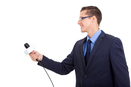 side view of journalist interviewing with microphone on white の写真素材