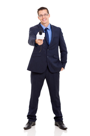 full length portrait of news reporter interviewing with microphoneの写真素材