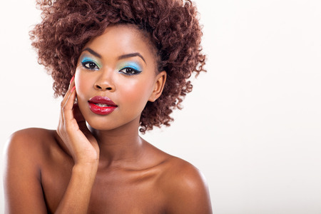 young afro american female model wearing colorful makeupの写真素材