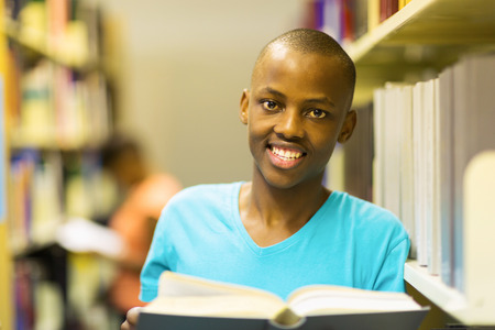portrait of male african american university student in library
