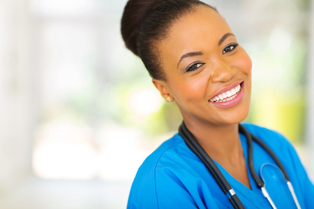 happy african nurse looking at the cameraの写真素材