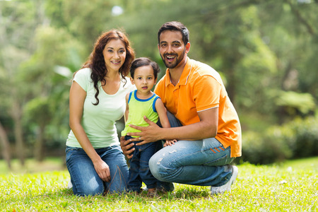 portrait of happy indian family outdoors