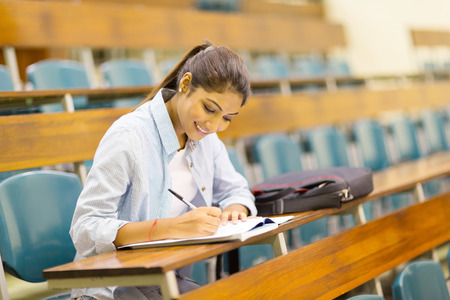 happy university student studying in lecture roomの写真素材