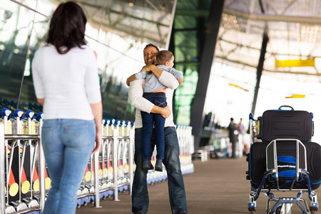 happy family reunion at airport