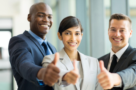 happy business group giving thumbs upの写真素材
