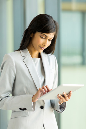 professional indian businesswoman working on tablet computerの写真素材